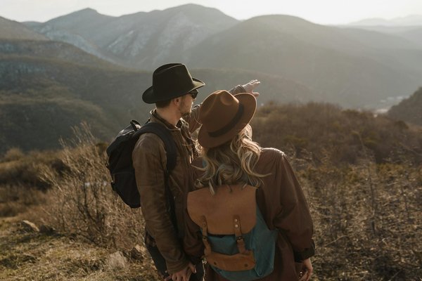 How can you plan a budget-friendly camping holiday in the UK?